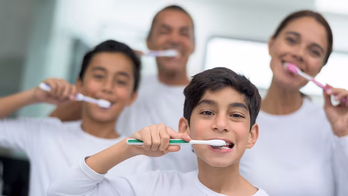 Preventative dentistry family brushing teeth