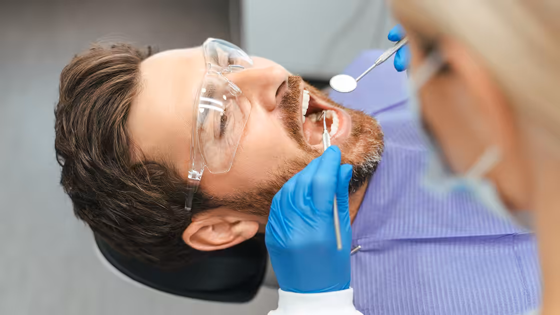 Scaling and root planing patient at office