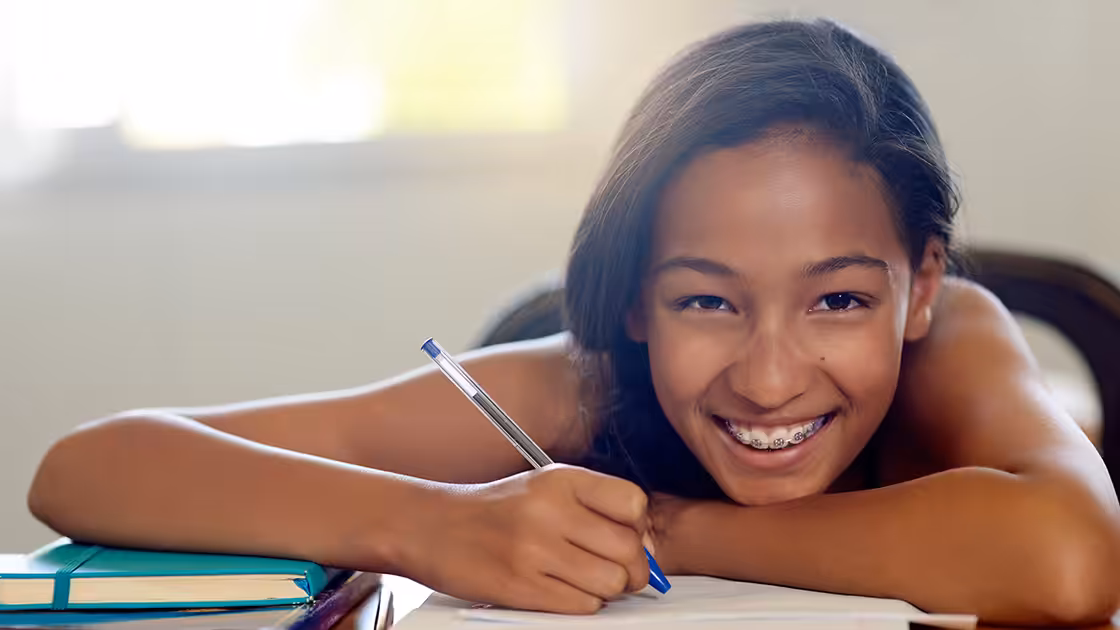 Student with orthodontic braces
